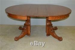 17111 Tiger Oak 48 Round Lion Head Dining Table