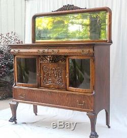 1890's Beautiful Tiger Oak Carved Buffet with Curved Glass Display Door & Mirror