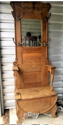 1890s Victorian Era Hall Tree Tiger Oak with beveled mirror and storage seat