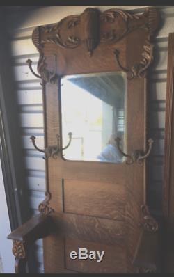 1890s Victorian Era Hall Tree Tiger Oak with beveled mirror and storage seat