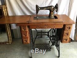 1924 Singer Sewing Treadle Sewing Machine in Tiger Oak Cabinet, 7 drawers
