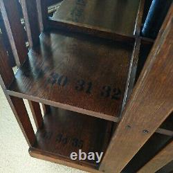 #2 of 3 ANTIQUE REVOLVING BOOKCASES with2 FLAT SHELVES, TIGER OAK, NUMBERS, CASTERS