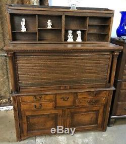 American 1920's Tiger Oak Dental Cabinet With Tambour And 27 Drawers