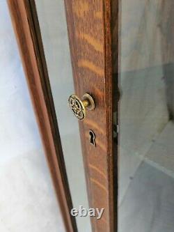 American Tiger Oak Bowed Bent Glass China Corner Cabinet with Claw Feet 1900s
