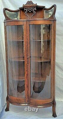 American Tiger Oak Bowed Bent Glass China Corner Cabinet with Griffins 1900s