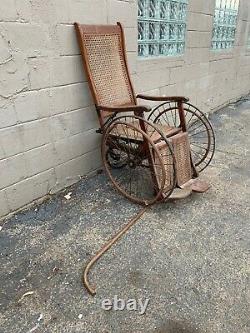 Antique Arrow Wheel Chair Tiger oak and wicker ww1 rare find 1800s (not Sure)