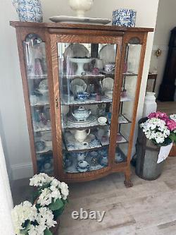Antique Claw Foot Tiger Oak China Display Cabinet with curved and bevel glass