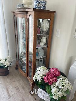 Antique Claw Foot Tiger Oak China Display Cabinet with curved and bevel glass
