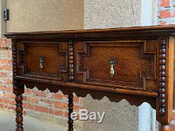 Antique English Tiger Carved Oak Hall Sofa Table Jacobean Style Brass Bobbin Leg