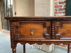 Antique English Tiger Carved Oak Hall Sofa Table Jacobean Style Brass Bobbin Leg