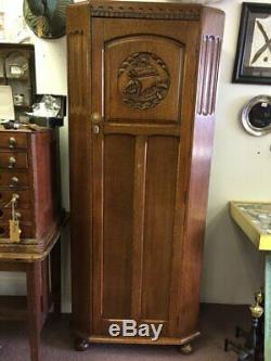Antique English Tiger Oak Relief Carved Hall Robe, Wardrobe Or Armoire With A Na
