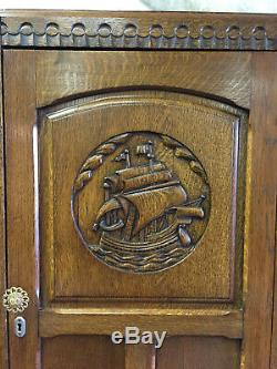 Antique English Tiger Oak Relief Carved Hall Robe, Wardrobe Or Armoire With A Na