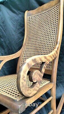 Antique Lincoln Tiger Oak Arm Rests Cane Rocking Chair with Sturdy Seat 1875
