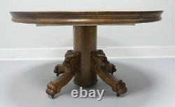 Antique Round Quartersawn Tiger Oak Dining Table with Paw Feet