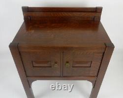 Antique Stickley Mission tiger oak mission server cabinet. 34. Inches wide