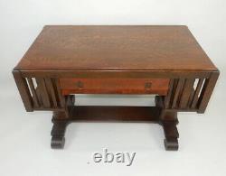 Antique Stickley era tiger oak mission desk with side Book shelves. 44 inches