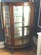 Antique Tiger Oak Curio Cabinet Curved Glass Mirrored Back Claw Feet Rare