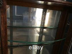 Antique Tiger Oak Curio Cabinet Curved Glass Mirrored Back Claw Feet RARE
