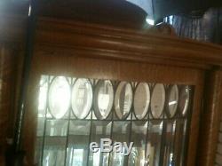 Antique Tiger Oak Curio Cabinet Curved Glass Mirrored Back Claw Feet with key RARE