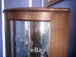 Antique Tiger Oak Curio Cabinet Serpentine Glass Mirrored Back Claw Feet RARE