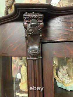 Antique Tiger Oak Curved Curio China Cabinet Ball And claw Feet. Lion Heads