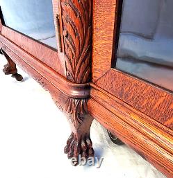 Antique Tiger Oak Lion / North Wind Carved 3 Door Bookcase with Claw Feet 1890's