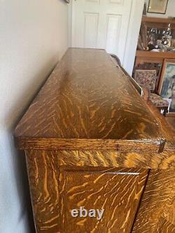 Antique Tiger Oak Raised Paneled S-Roll Top Desk with slide outs