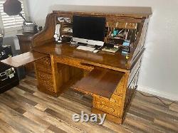 Antique Tiger Oak Raised Paneled S-Roll Top Desk with slide outs