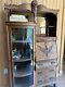 Antique Tiger Oak Secretary With North Wind Face On Top And Curved Glass