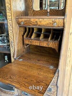 Antique Tiger Oak Secretary with North Wind Face on Top and Curved Glass