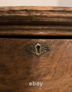 Antique Tiger Oak Serpentine Four Drawer Dresser