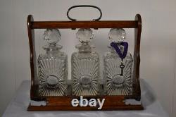 Antique Tiger Oak Tantalus with 3 Decanters