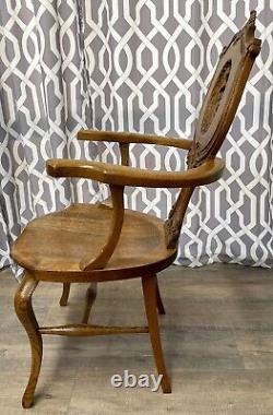 Antique Victorian Carved Tiger Oak Cherub Arm Chair