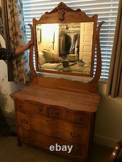 Antique early-1900s tiger oak dresser with serpentine mirror good condition $586