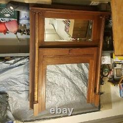 Antique fireplace mantle, made of tiger oak, 83tall by57wide, mirror