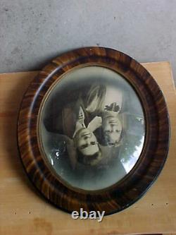 Antique oval gesso tiger oak wood bubble glass picture frame 22x18 inch