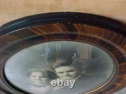 Antique oval gesso tiger oak wood bubble glass picture frame 22x18 inch