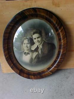 Antique oval gesso tiger oak wood bubble glass picture frame 22x18 inch