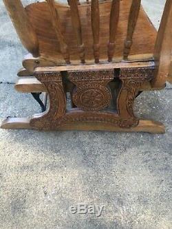 Antique tiger oak rocking chair