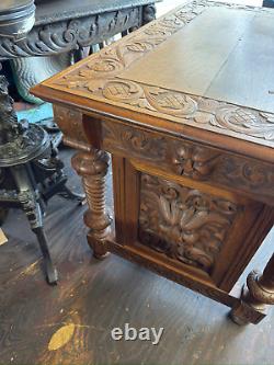 Antique victorian 1880 tiger oak northwind & lion head library table horner