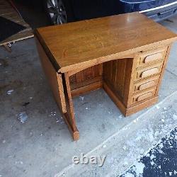 Beautifully restored antique craftsman solid oak desk w 4 drawers & drop leaf