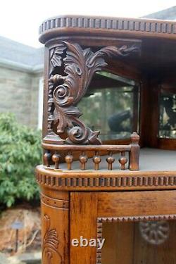 Collector quality antique Berkey & Gay tiger oak carved corner cabinet original