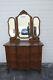 Early 1900s Serpentine Carved Tiger Oak Low Dresser With Trifold Mirrors 4670