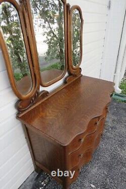 Early 1900s Serpentine Carved Tiger Oak Low Dresser with Trifold Mirrors 4670