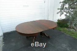 Early 1900s Tiger Oak Claw Feet Dining Table with Three Leaves 1084
