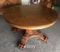 Early Tiger Oak Carved Claw Feet Dining Table with Leaves lion dragon head claw