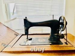 Ornate Antique Franklin Treadle Sewing Machine c. 1900's Tiger Oak Cabinet