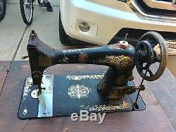 Singer Sewing Machine early 1900s 27-4 Tiger Oak cabinet treadle instru attach's