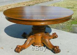 Solid Tiger Oak Dining Table 54 Inches RoundExtends to 77 inches with3 leaves
