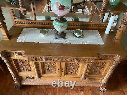 Tiger Oak Mirrored Sideboard Buffet With Griffins and Detailed Carvings